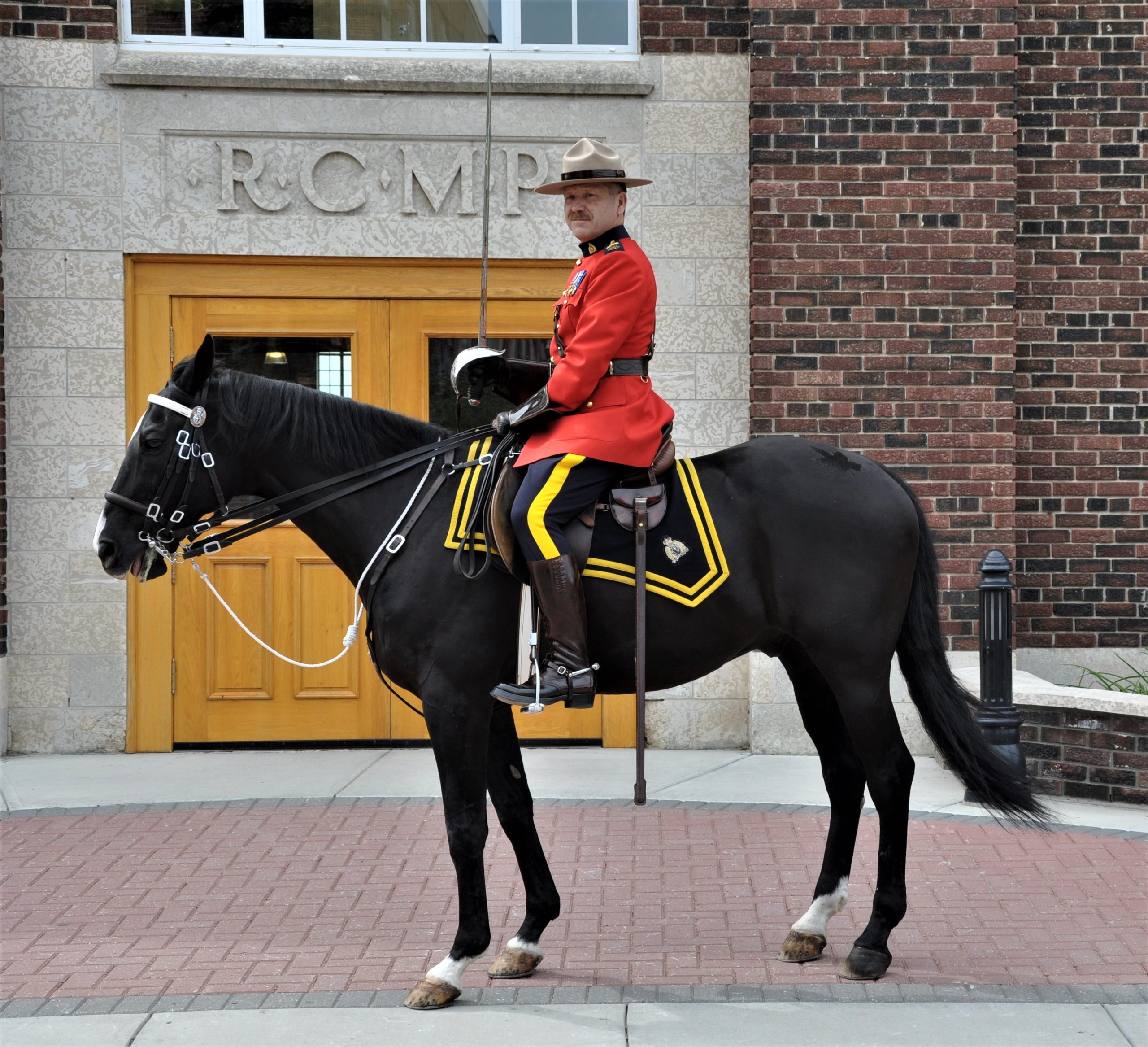 2010-Sep-4-Darrell-on-Musical-ride-horse-Depot-Darrell-takes-salute-Regina-34-scaled